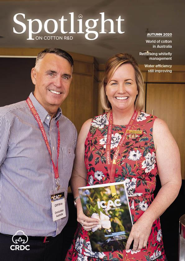 Man and woman smiling on spotlight cover