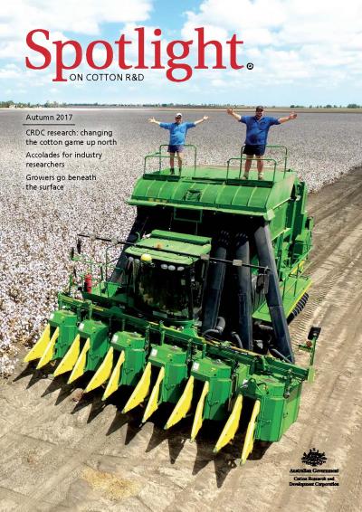 Cover of Spotlight Magazine - Autumn 2017. Two people standing on top of a cotton picker as it rests stationary alongside a cotton paddock ready for harvest.