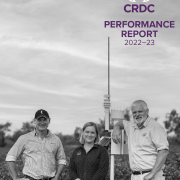 Three people standing in a cotton field. Cover of the CRDC Performance Report.